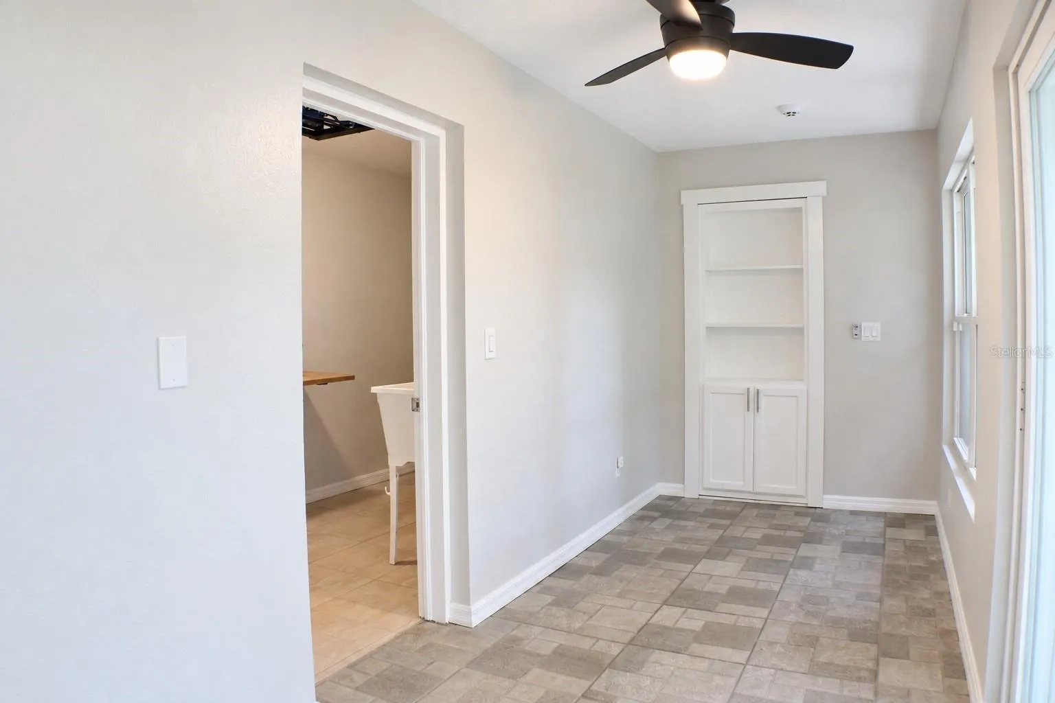 Sun Room and entry to Laundry Room