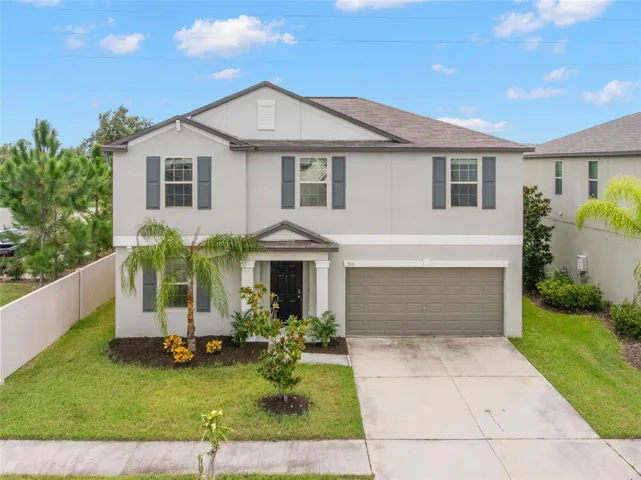 Five bedrooms, 2½ baths and nearly 2,900 square feet make an immediate impression in this 2022-built Apollo Beach home, with a first-floor primary suite, flexible living spaces and a big backyard with room for a future pool.