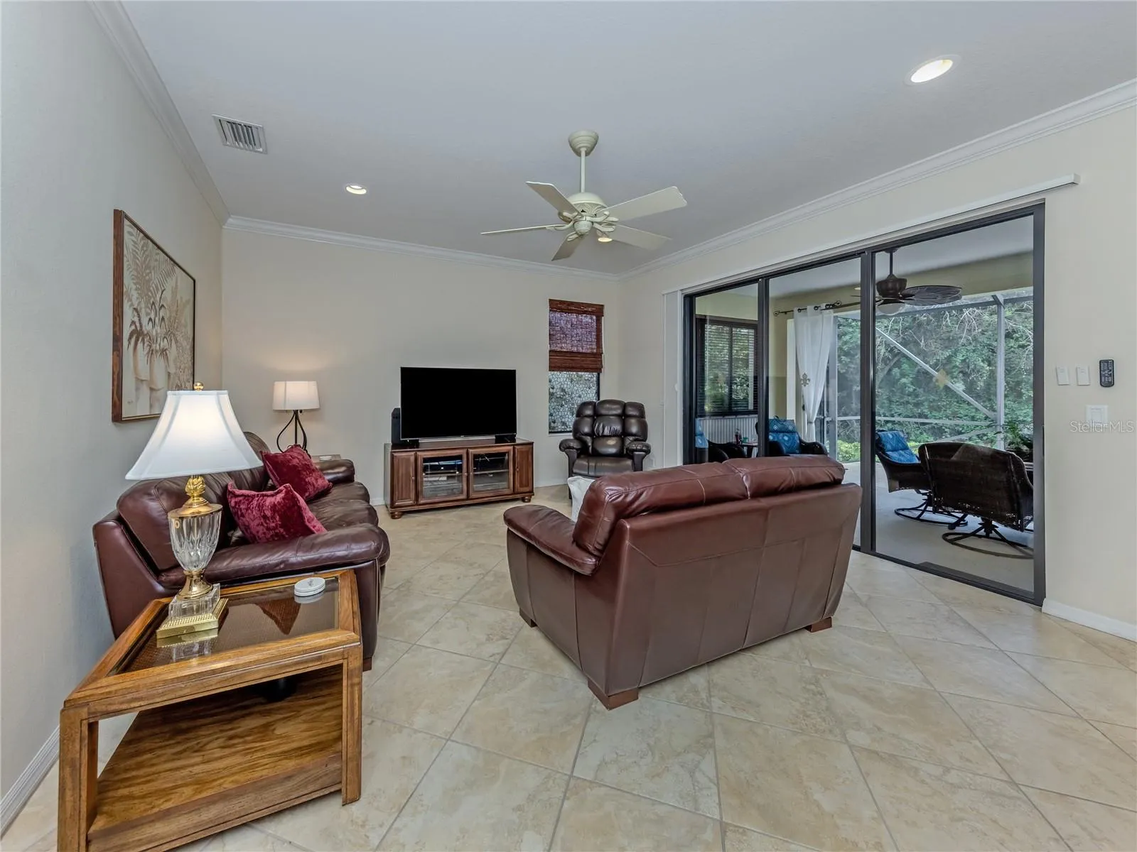 Family Room, with sliders leading to an extended lanai