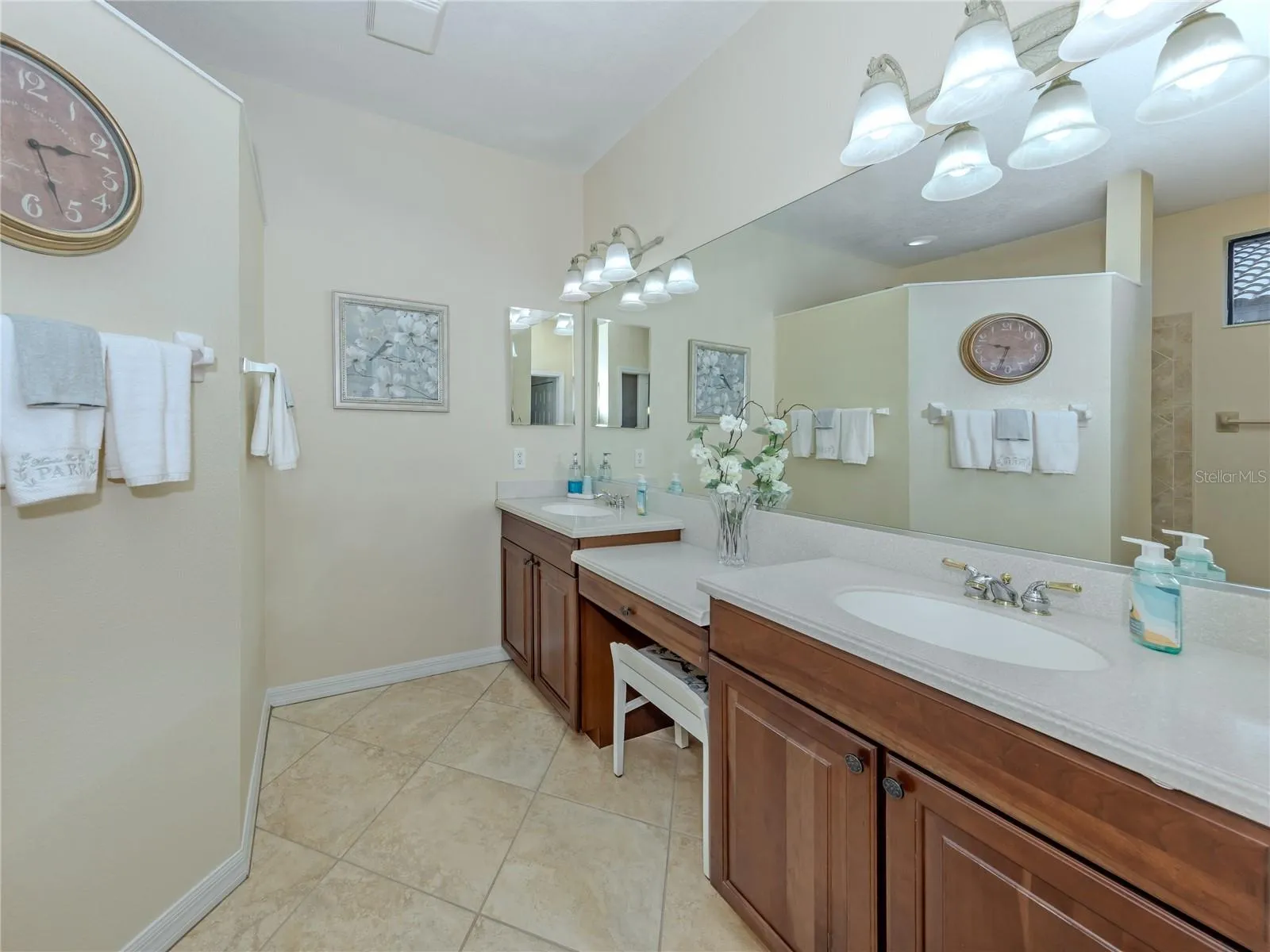 Master Bathroom with dual sinks, and makeup area