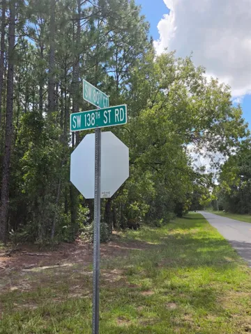 Pave road to property