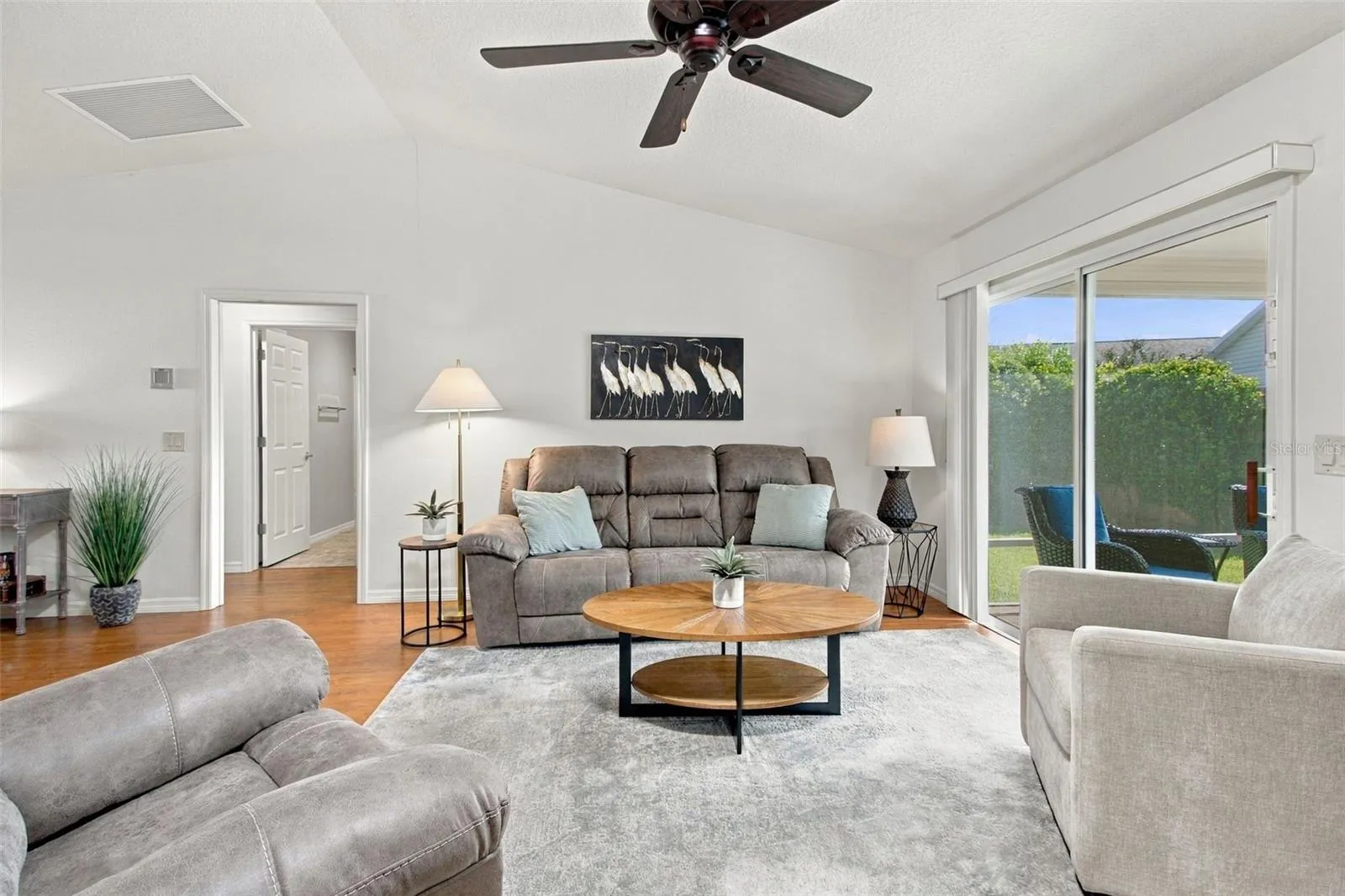 living rm with door to guest bd's
