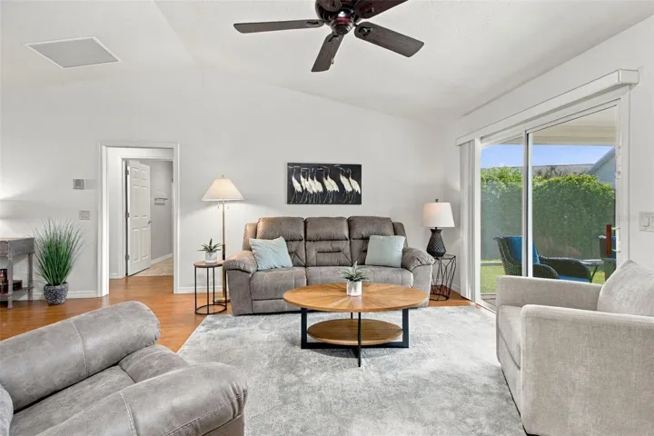living rm with door to guest bd's