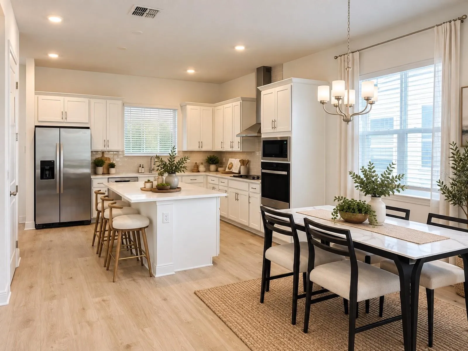 Dining/kitchen. Virtually staged