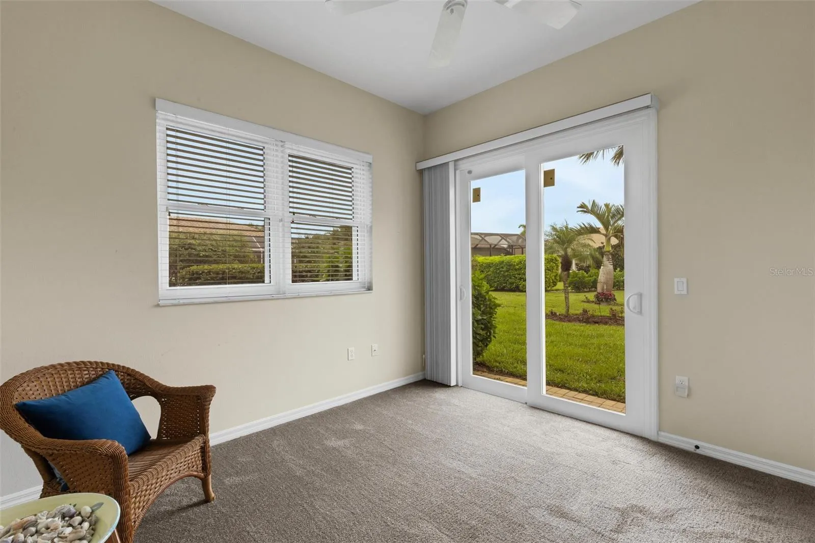 3rd bedroom with sliding doors to back yard