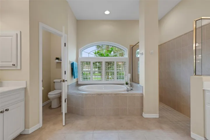 En-suite bathroom  Walk in shower, tub and 2 vanities