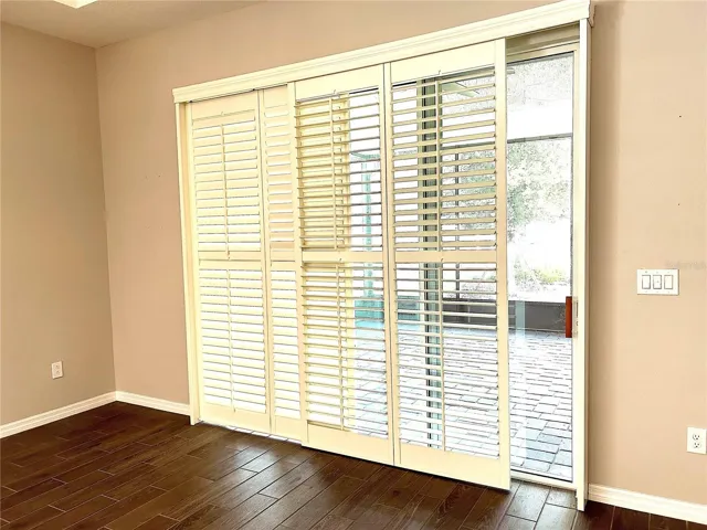 Shutter panels halfway open- slider door