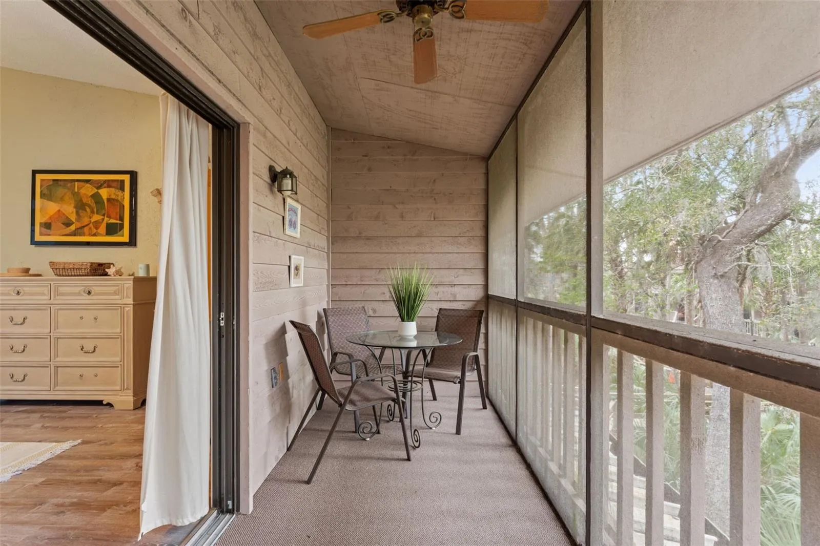 Screened-in porch off the primary bedroom