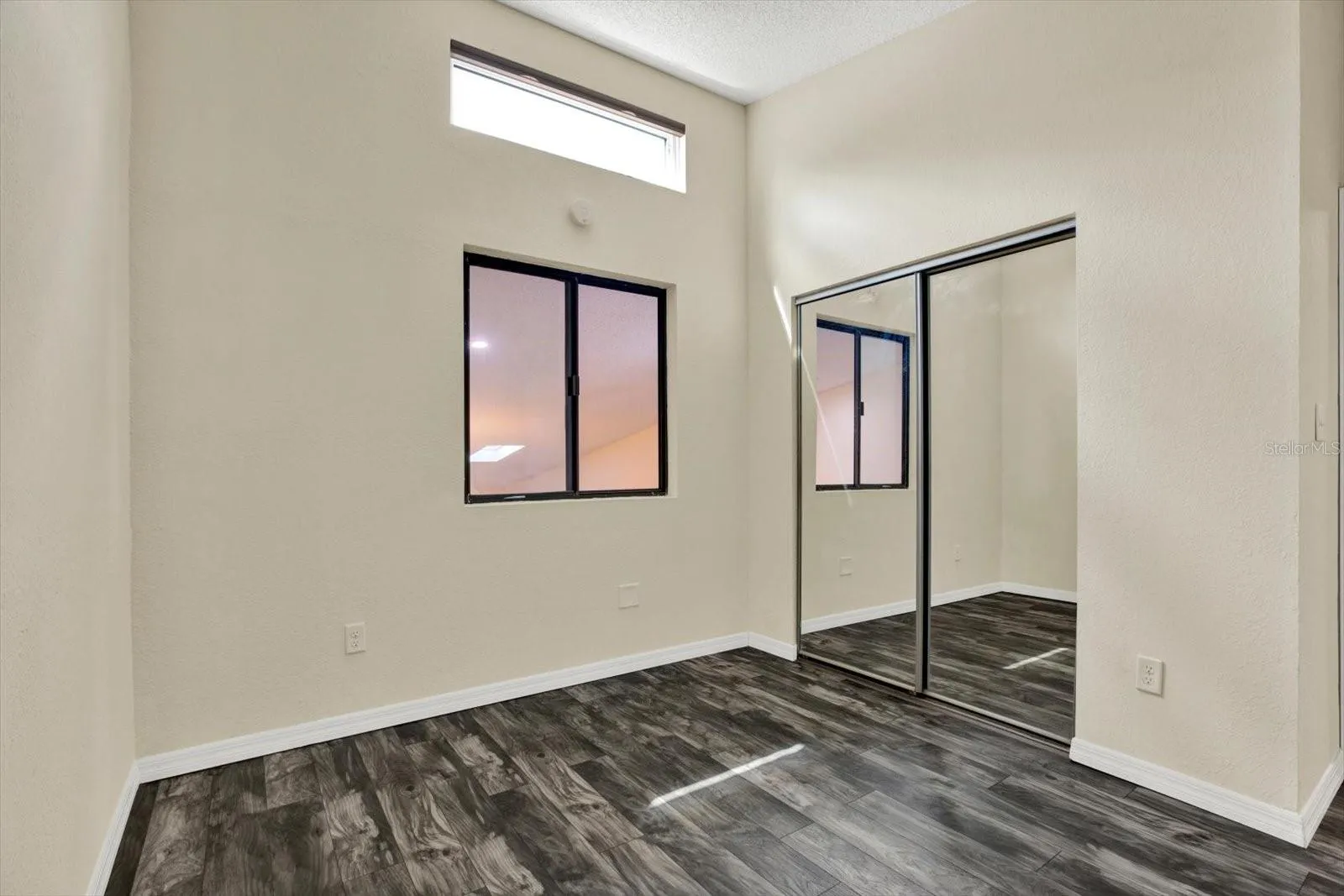 SECONDARY BEDROOM/ LARGE CLOSET AND LAUNDRY SHOOT