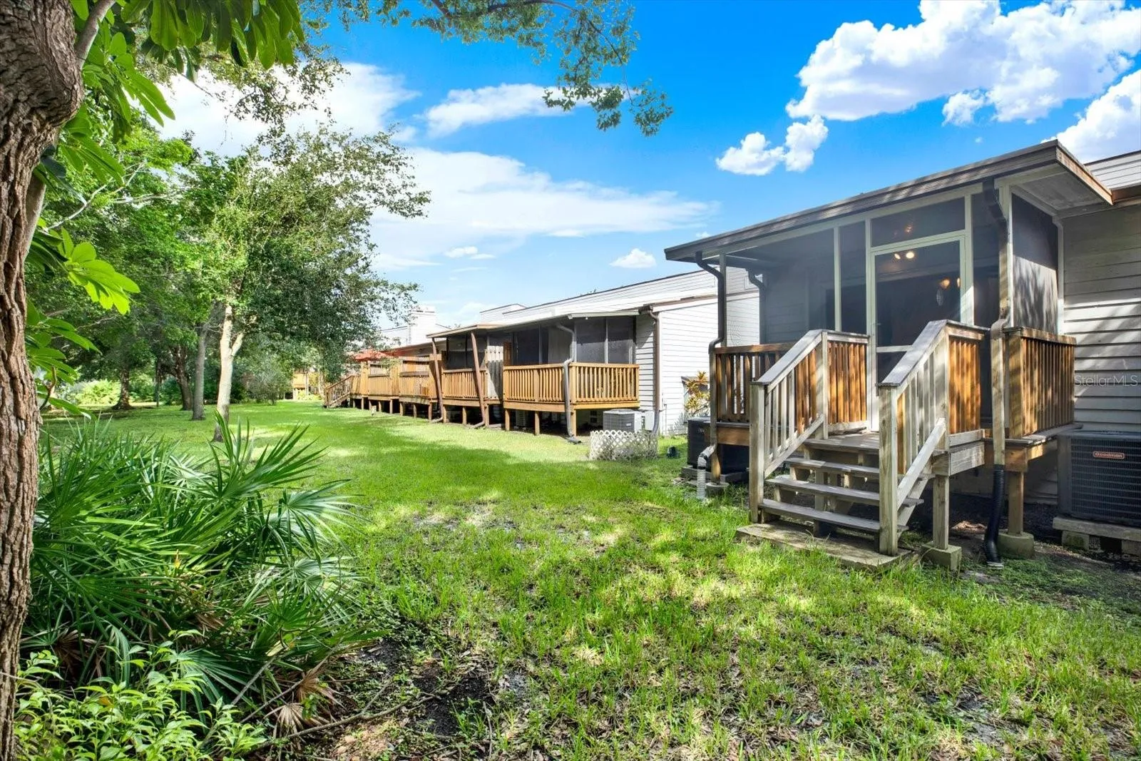 REAR SCREEN ENCLOSED PATIO WITH STAIRCASE