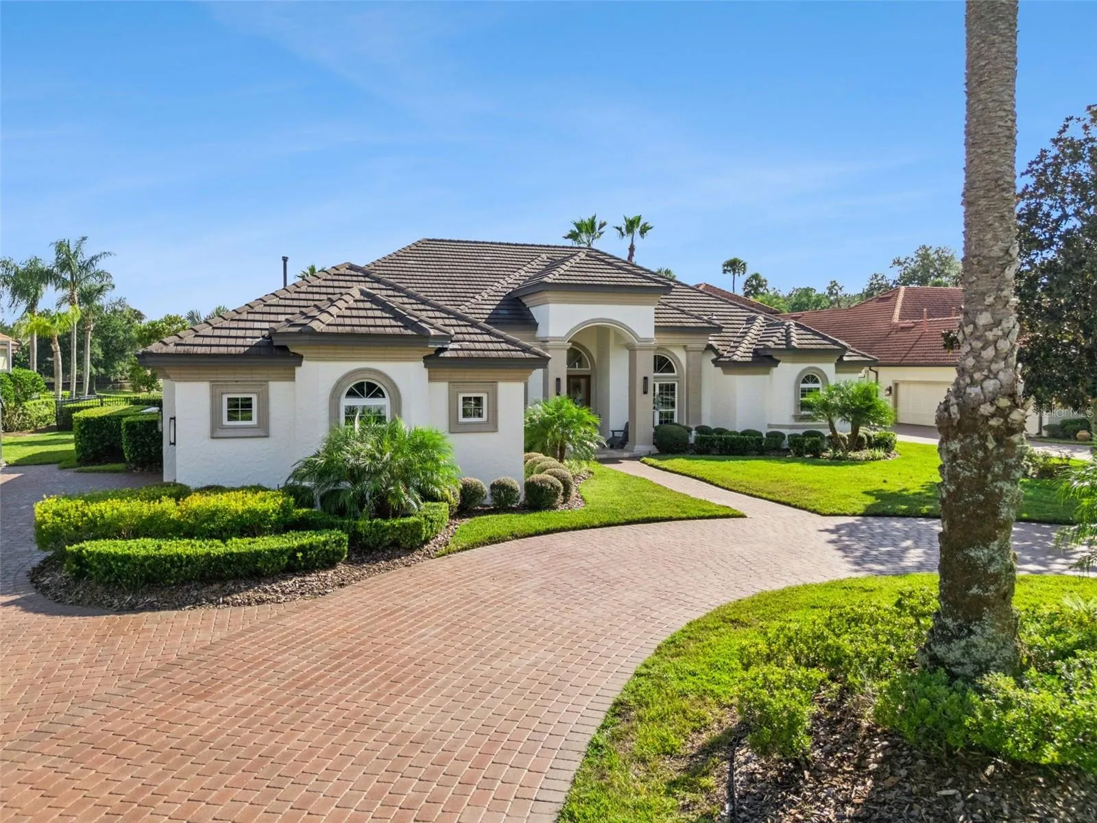Beautifully maintained Alaqua Lakes residence tucked away on a peaceful cul-de-sac.