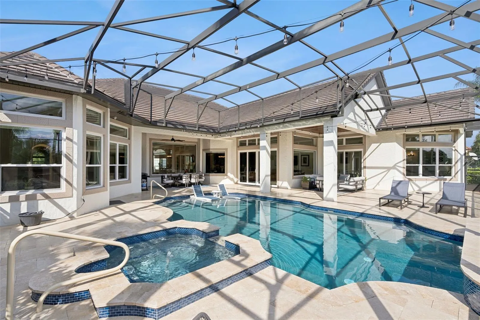 Covered LanaiExpansive covered lanai featuring beautiful tongue-and-groove wood ceilings and plenty of room for outdoor dining and relaxation.Pool AreaUpdated screened pool featuring a pebble-finish interior, sun shelf, glass tile, travertine decking, updated equipment and a pool heater.Backyard and Water ViewsEnjoy tranquil water and conservation views from the private backyard, with the Wekiva Preserve creating a peaceful natural backdrop.Outdoor LivingA beautiful Florida outdoor-living retreat with a spacious covered lanai, updated pool and serene water and conservation views.