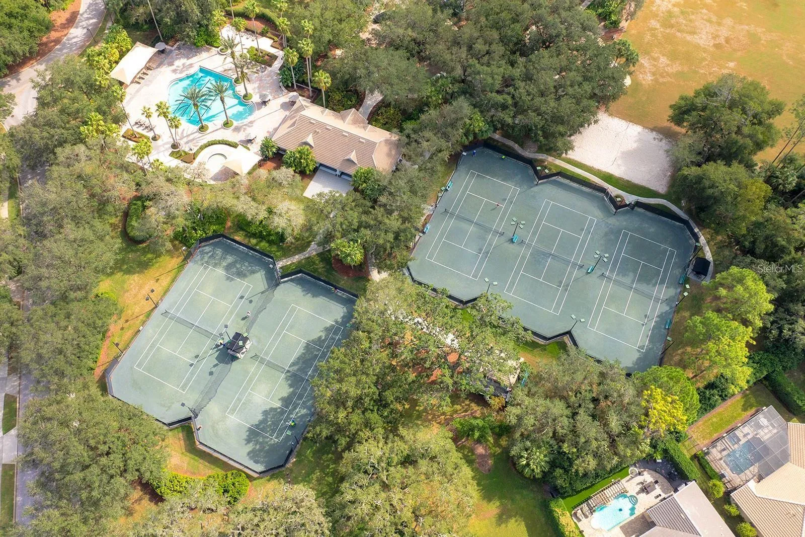 Enjoy the exceptional Alaqua Lakes lifestyle with golf, tennis, community parks, playgrounds and 24-hour guard-gated security, all surrounded by beautiful natural scenery.