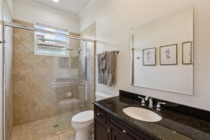 Full Guest BathroomConvenient full bathroom serving Bedroom Four, the bonus room and the rear living areas.