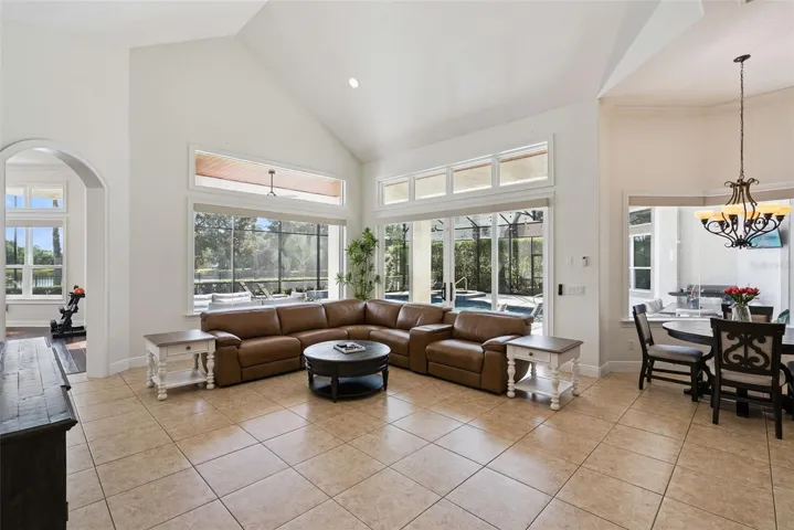 Family RoomThe welcoming family room offers generous gathering space and beautiful views of the pool and backyard.