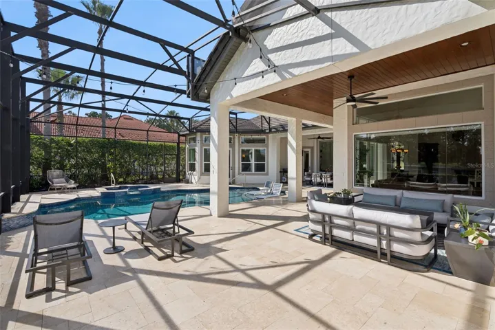 Covered LanaiExpansive covered lanai featuring beautiful tongue-and-groove wood ceilings and plenty of room for outdoor dining and relaxation.Pool AreaUpdated screened pool featuring a pebble-finish interior, sun shelf, glass tile, travertine decking, updated equipment and a pool heater.Backyard and Water ViewsEnjoy tranquil water and conservation views from the private backyard, with the Wekiva Preserve creating a peaceful natural backdrop.Outdoor LivingA beautiful Florida outdoor-living retreat with a spacious covered lanai, updated pool and serene water and conservation views.