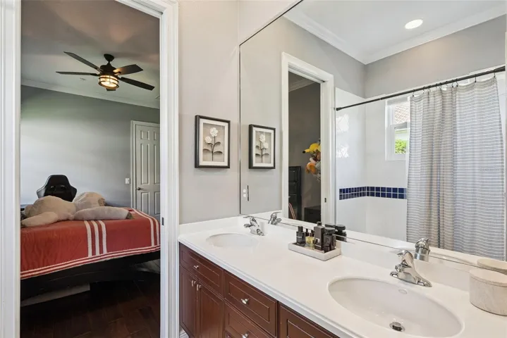 Jack-and-Jill BathroomBedroom Two and Bedroom Three share a convenient Jack-and-Jill bathroom with a tub-and-shower combination.