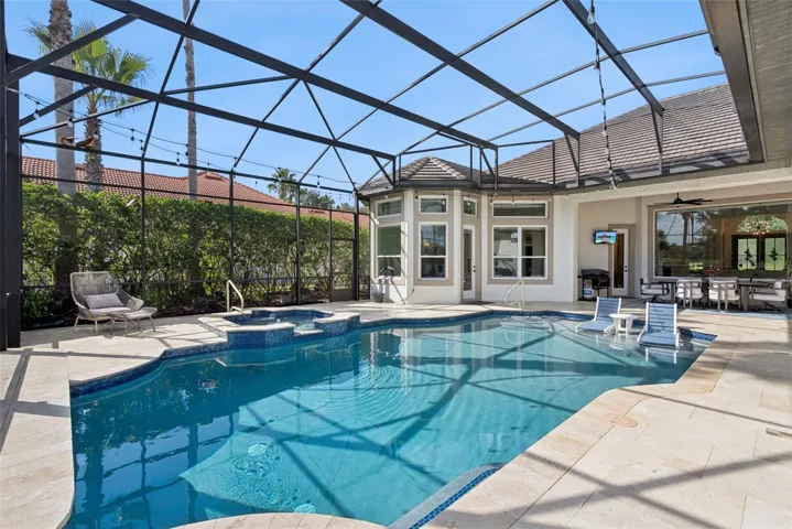 Covered LanaiExpansive covered lanai featuring beautiful tongue-and-groove wood ceilings and plenty of room for outdoor dining and relaxation.Pool AreaUpdated screened pool featuring a pebble-finish interior, sun shelf, glass tile, travertine decking, updated equipment and a pool heater.Backyard and Water ViewsEnjoy tranquil water and conservation views from the private backyard, with the Wekiva Preserve creating a peaceful natural backdrop.Outdoor LivingA beautiful Florida outdoor-living retreat with a spacious covered lanai, updated pool and serene water and conservation views.