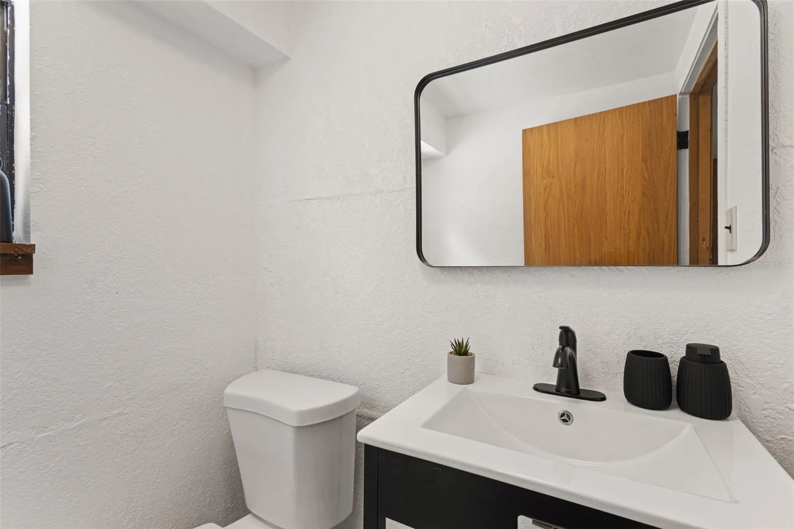 1/2 bathroom downstairs on main level