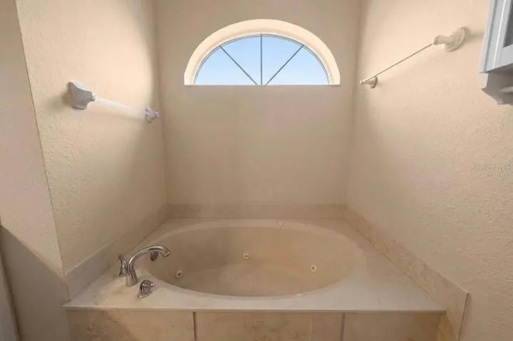 Primary Bathroom/ Soaking TubVirtually Staged