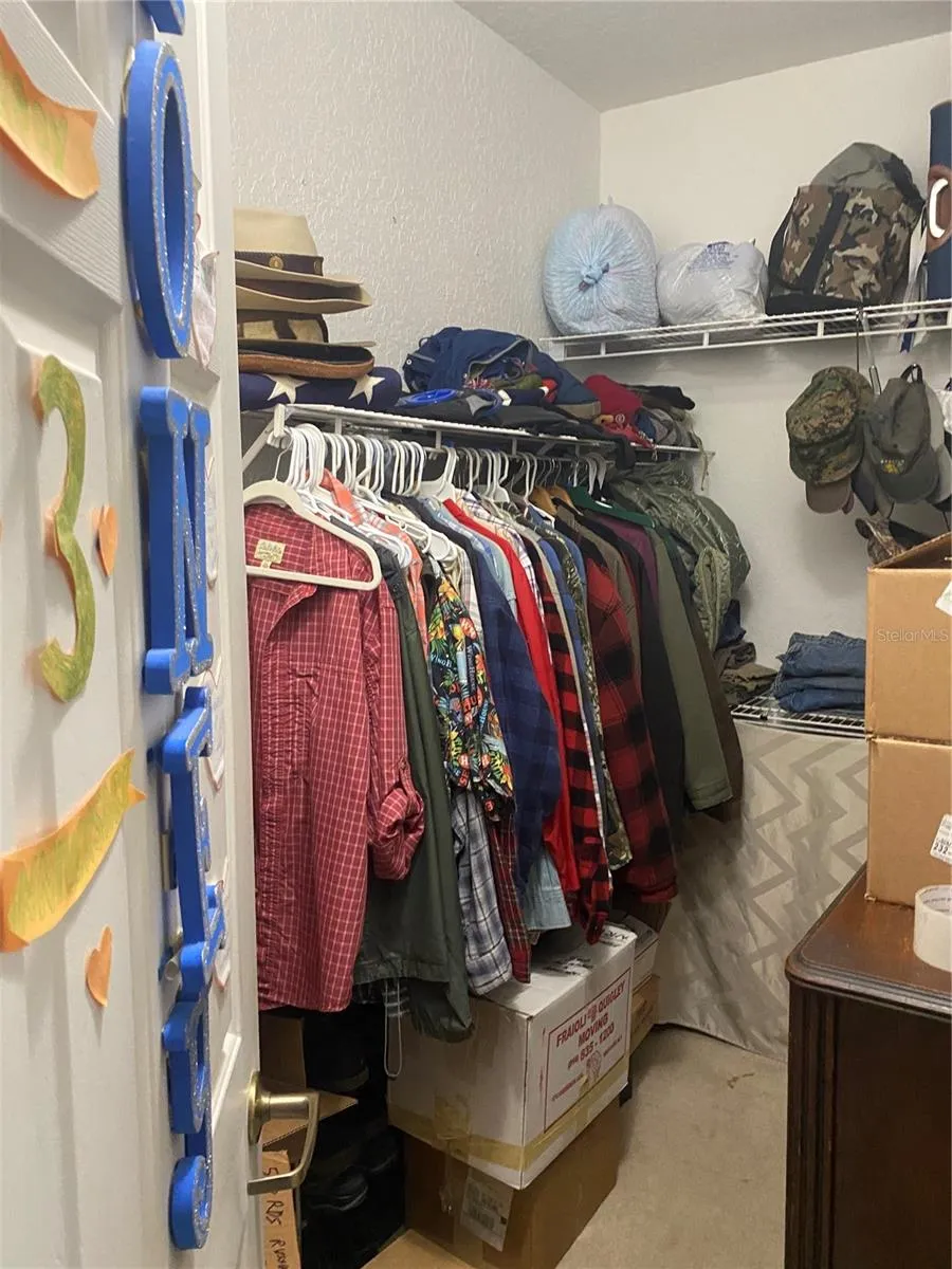 Walk-in closet in the primary bedroom area.