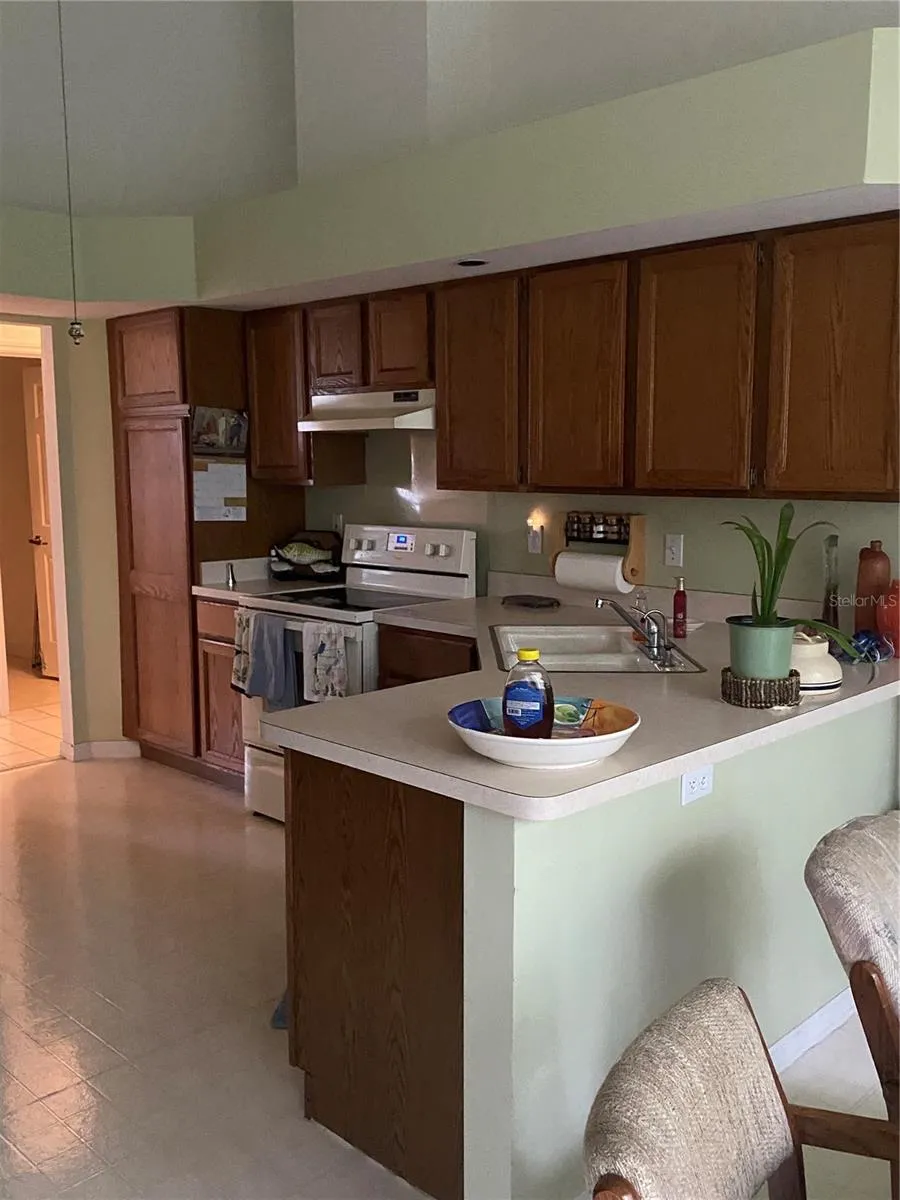 kitchen area, high ceiling, open large windows