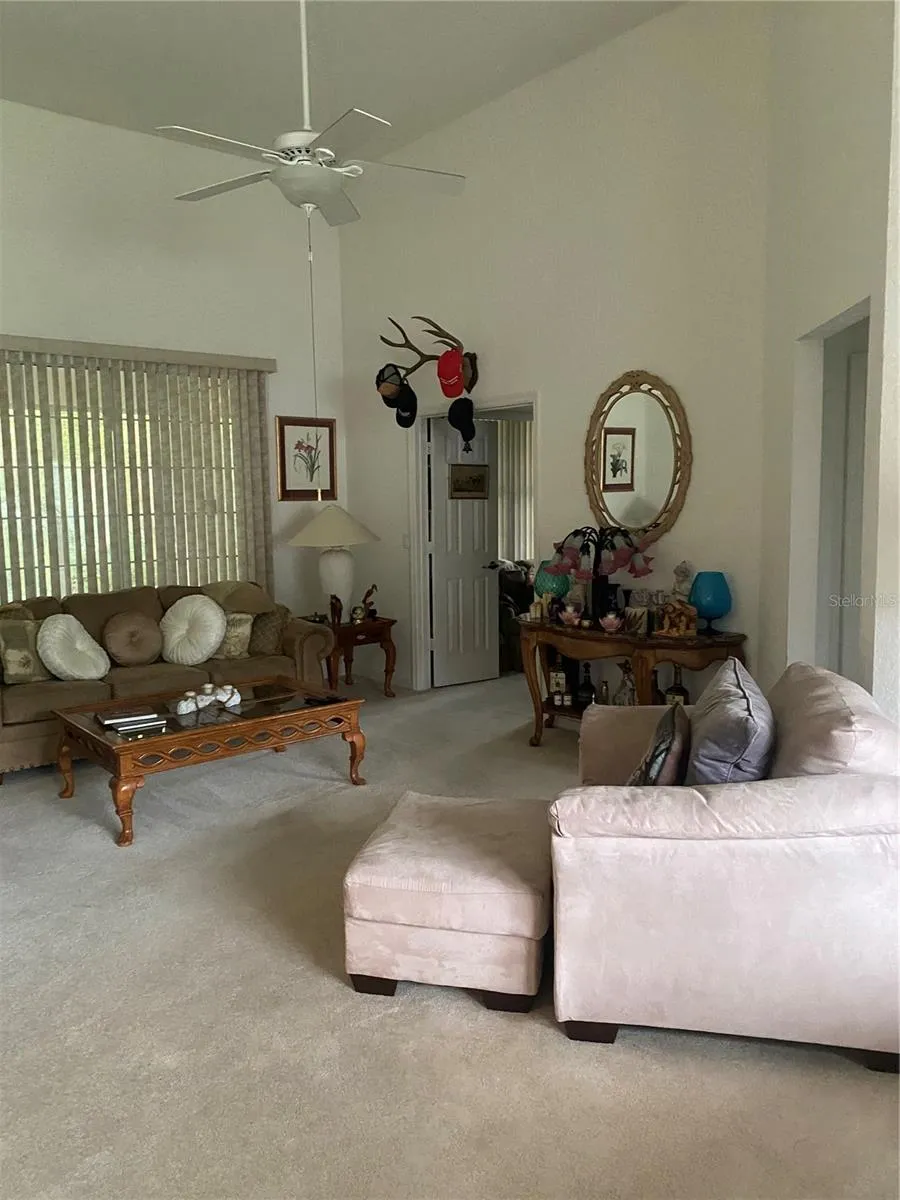 Living room area, large area, comfortable space.