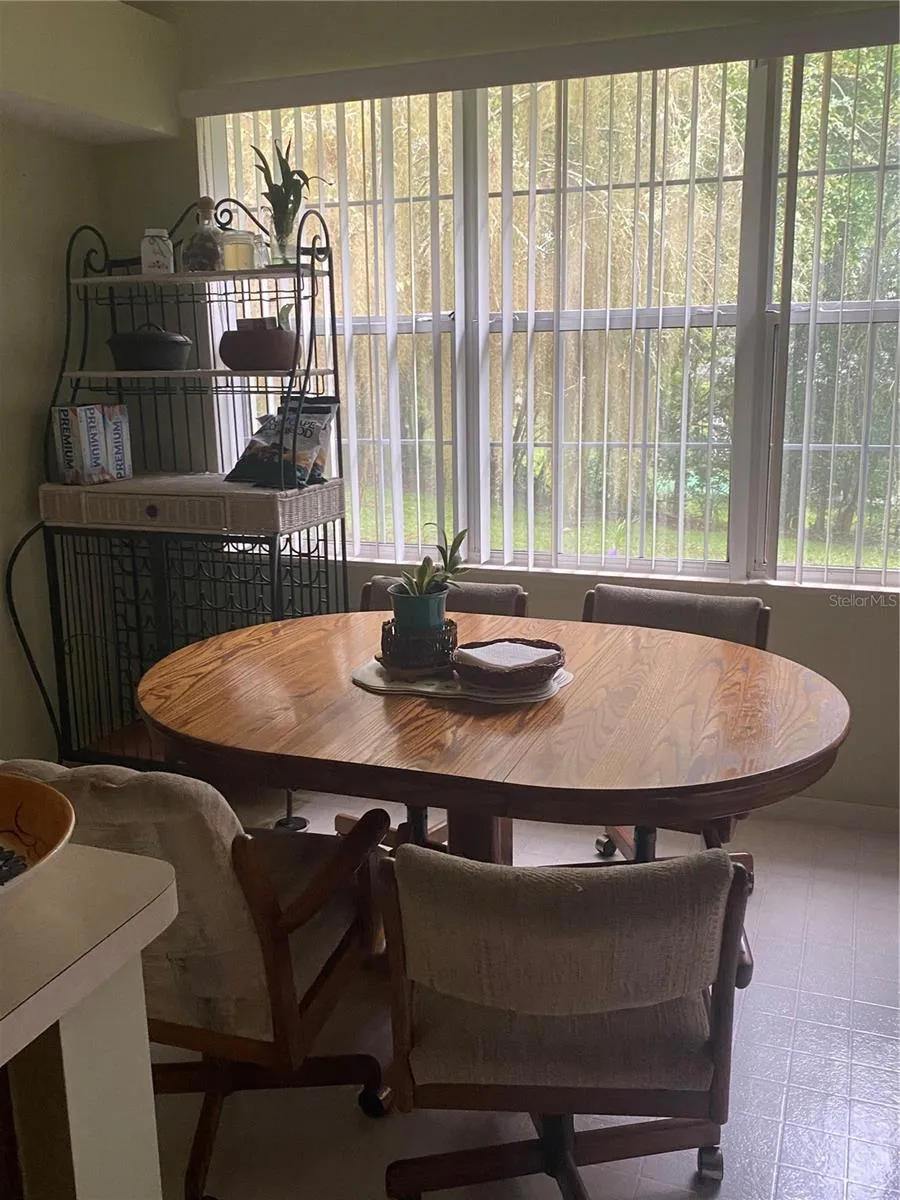 Kitchen is large to have Breakfast nook near the window looking at the backyard views.