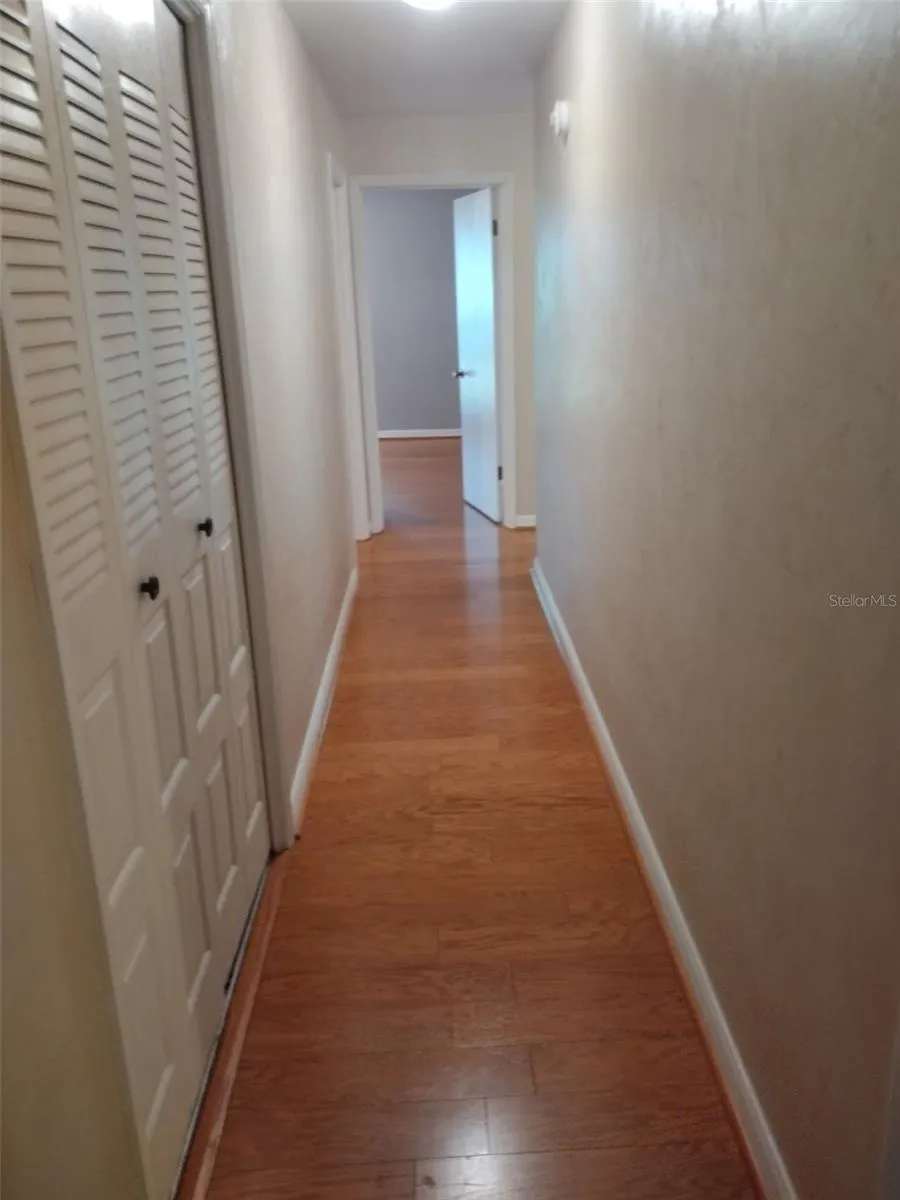 Hallway from Primary Suite to Bedrooms