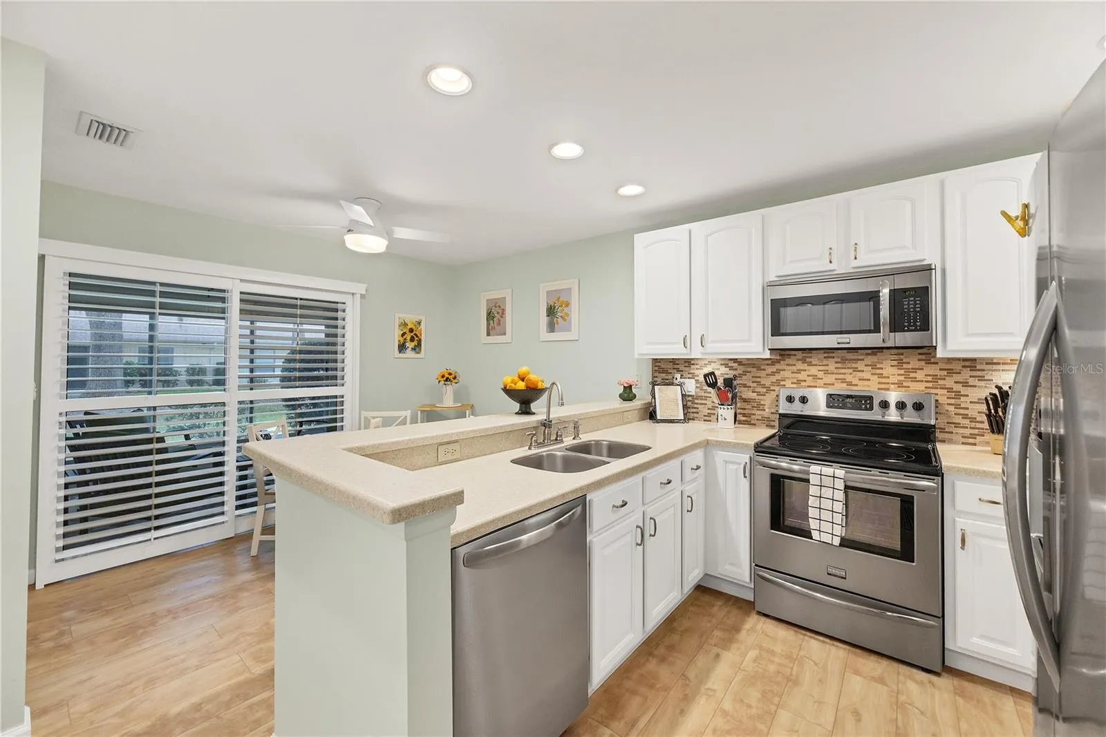Kitchen and eat in kitchen area