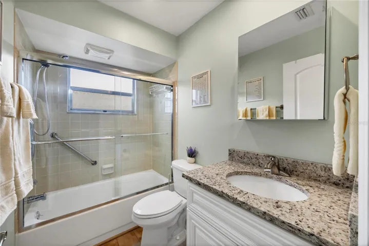 Guest bathroom with tub