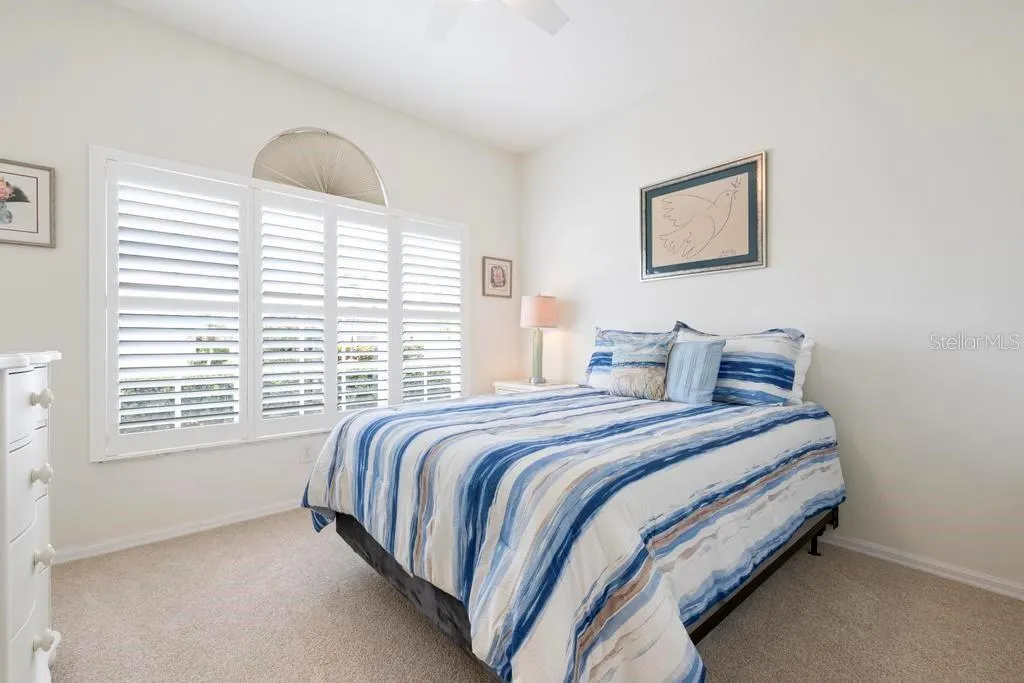 Guest Bedroom 2 with plantation shutters