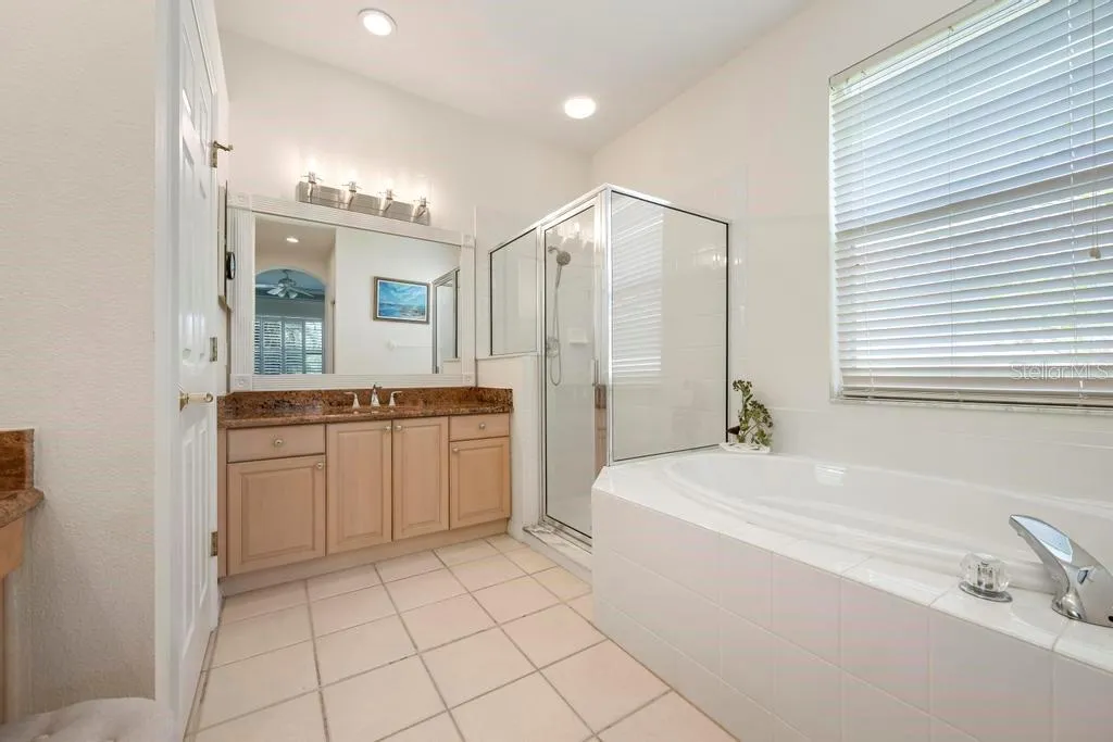 Primary Bathroom - dual vanities &amp; granite, garden tub, separate shower, toilet closet