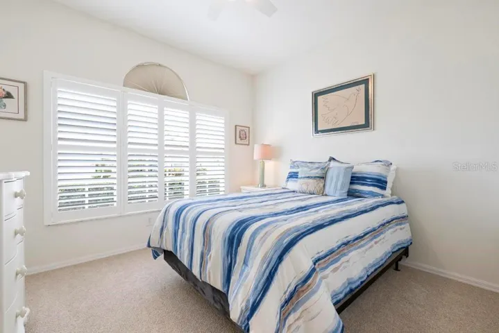 Guest Bedroom 2 with plantation shutters