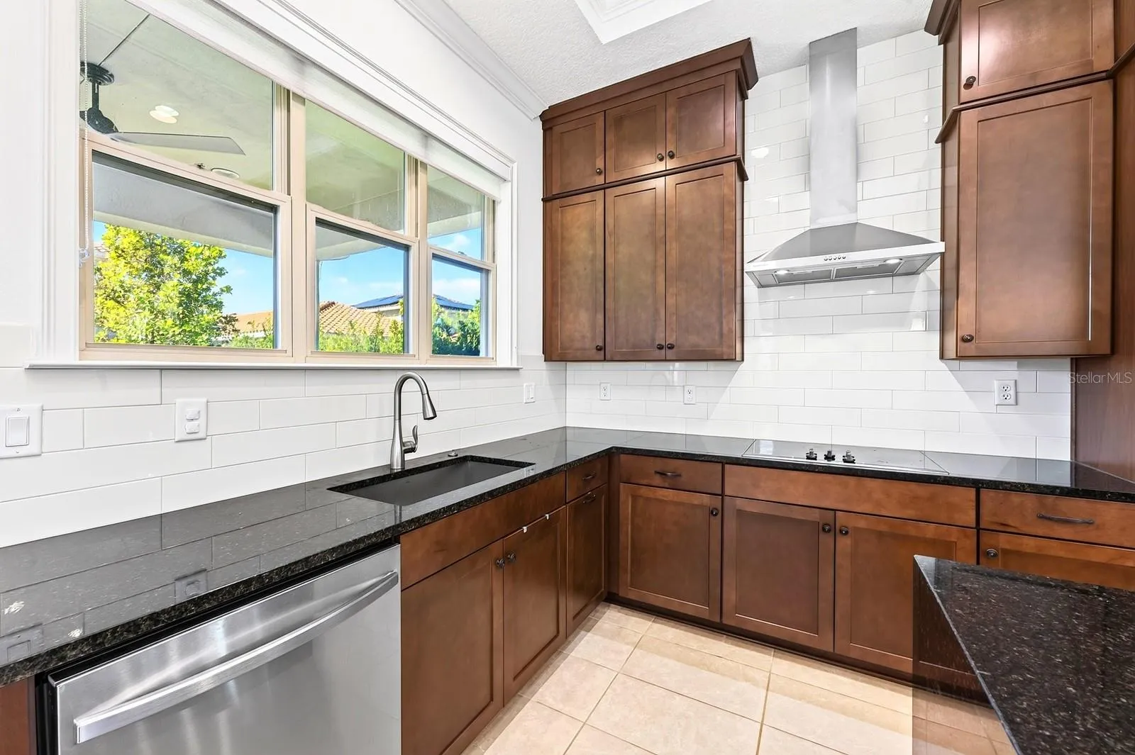 A window over the sink pulls in the natural light.