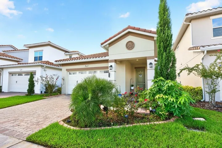 2022 BUILT, single story home with ***PAID-OFF SOLAR***, SUMMER KITCHEN &amp; FENCED BACKYARD in the sought-after 24 HOUR GUARD GATED Eagle Creek golf community of Lake Nona!