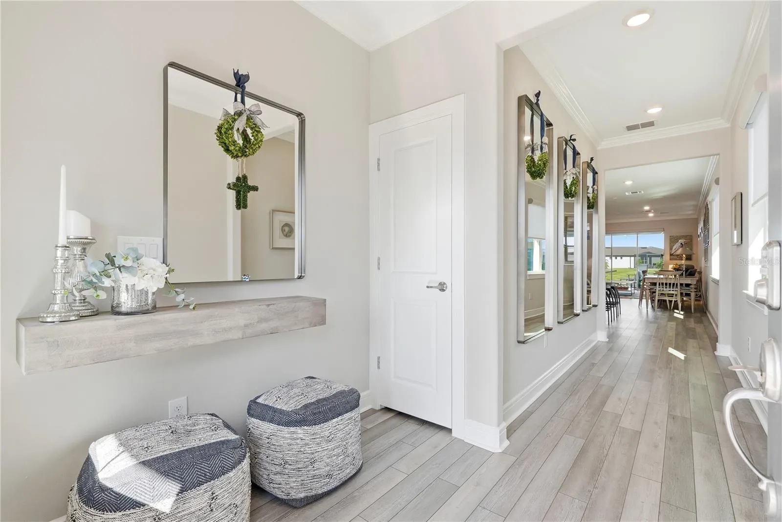 As you step inside you will notice the 9 foot ceilings and bright entrance.