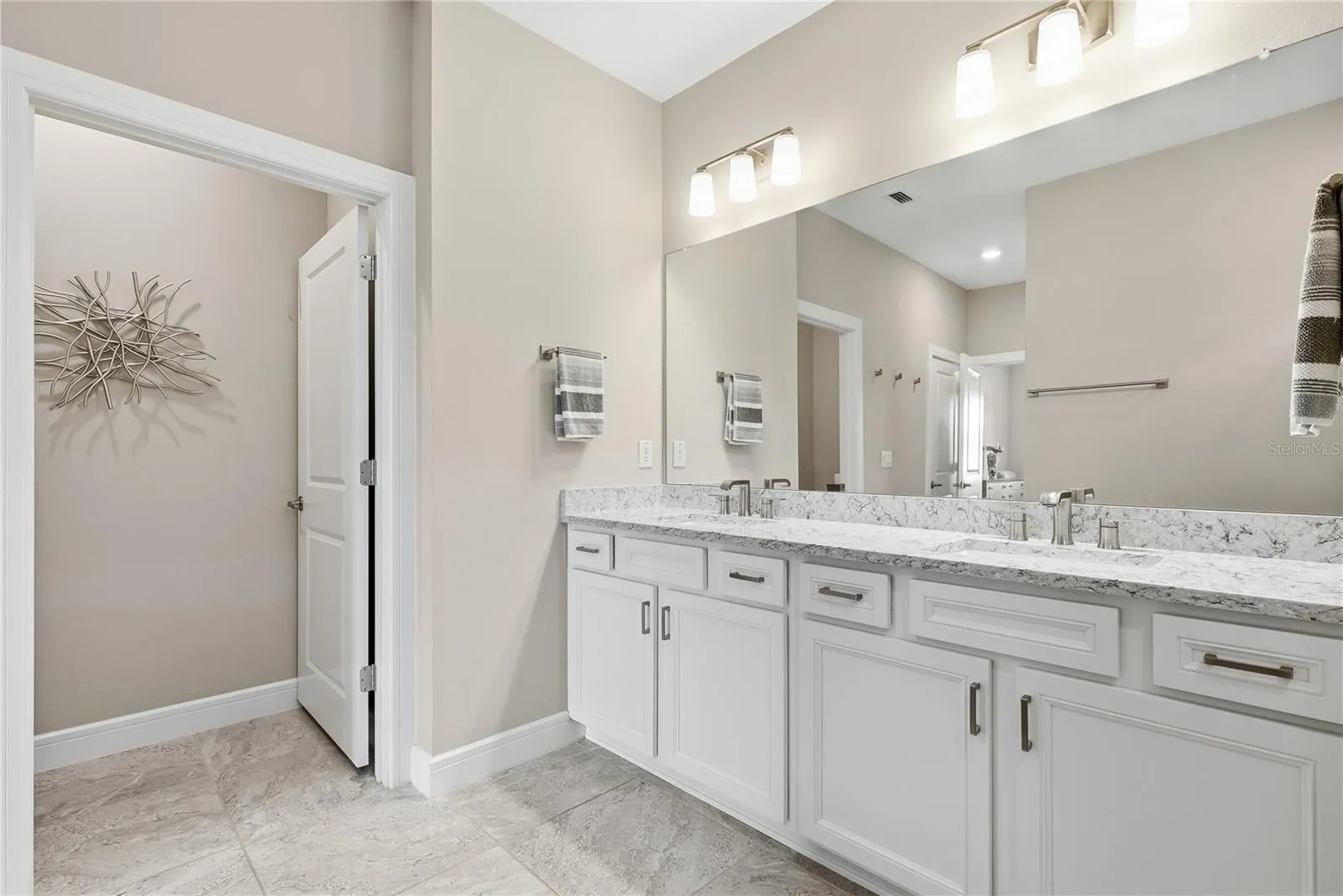 Primary Ensuite with double sinks and separate water closet.