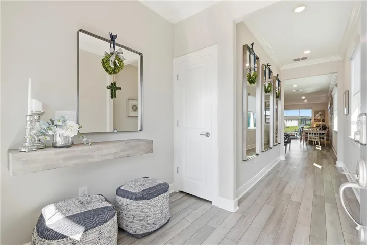 As you step inside you will notice the 9 foot ceilings and bright entrance.