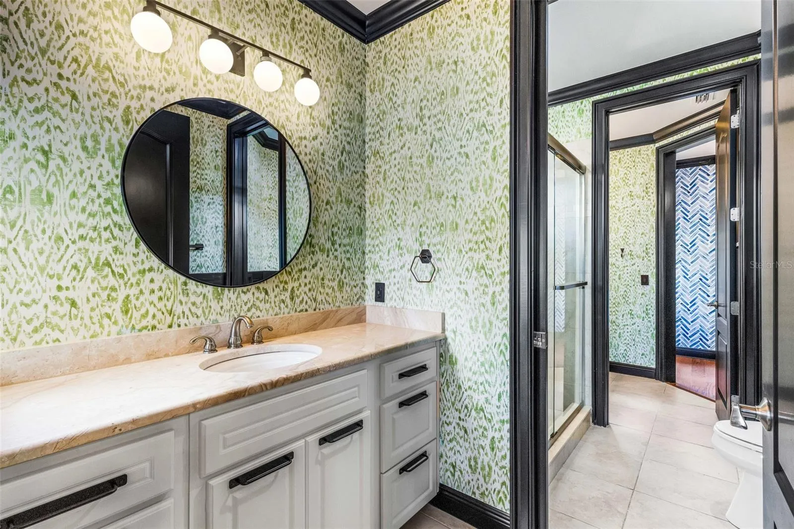 a private bathroom vanity area to the shared "J &amp; J" bathroom.