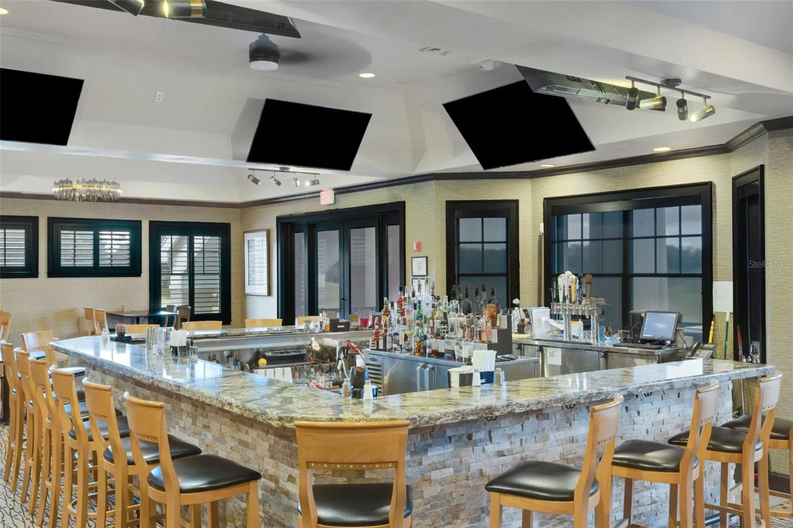 And the U-Shaped Bar features a view and sports on TV at the same time.