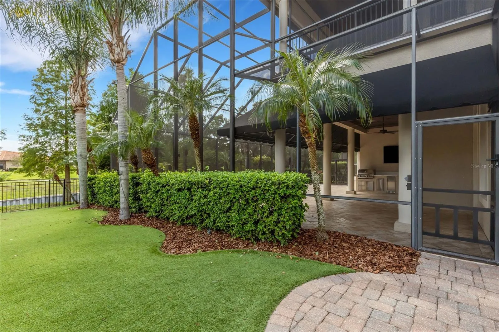 Step outside the enclosure to the fenced in play or dog area . . .