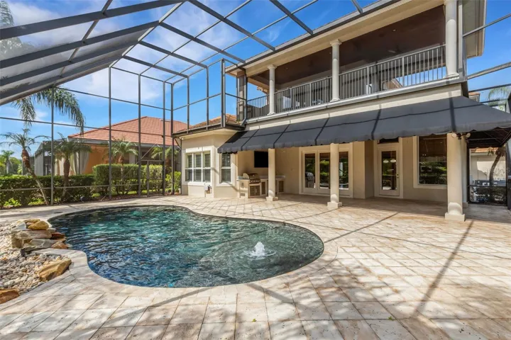 Travertine decking all around.
