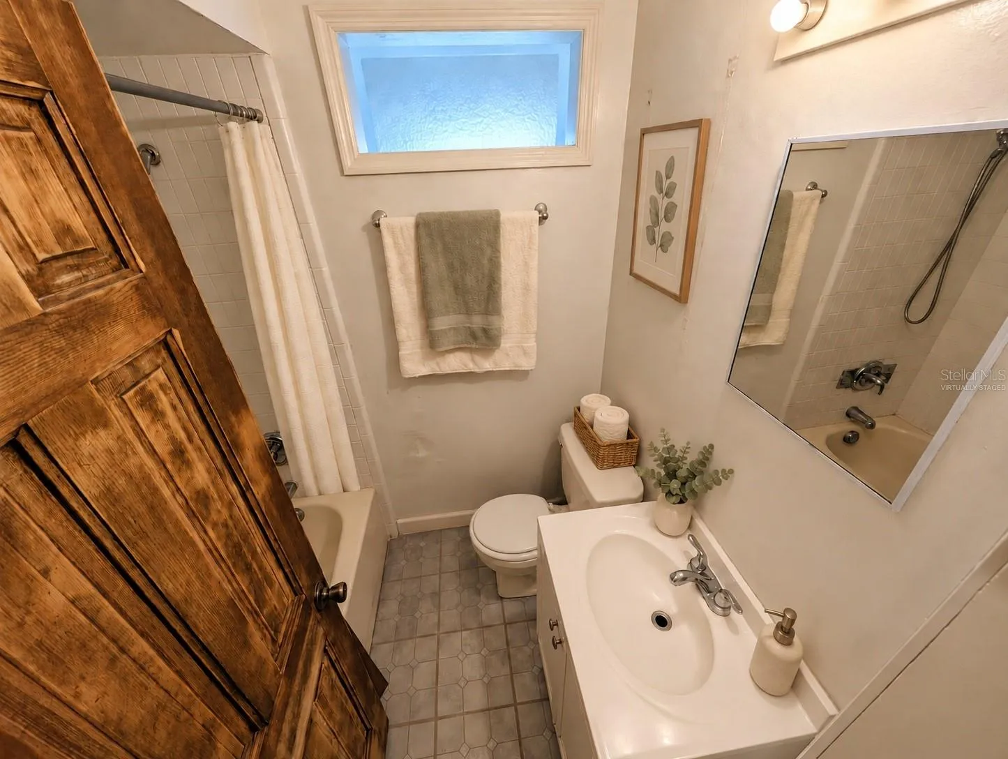 Virtually Staged Full Bathroom with tub/shower combo