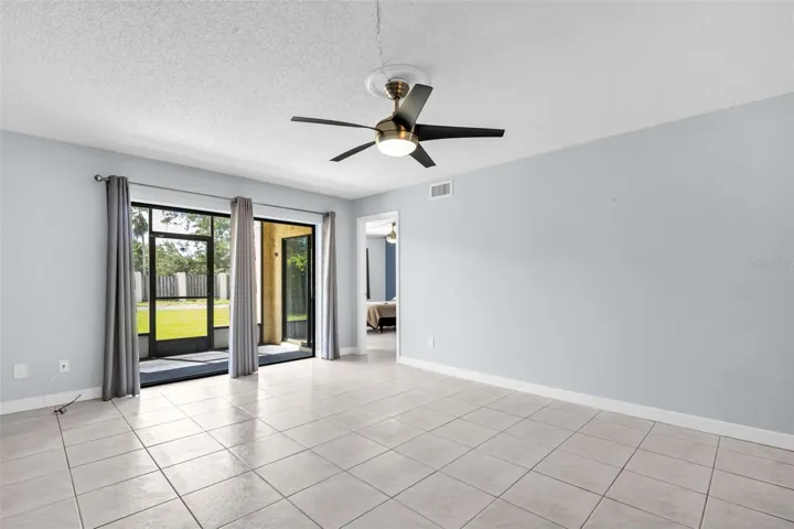 Living Room to Lanai, patio and 2'10" x 6'7" Storage room