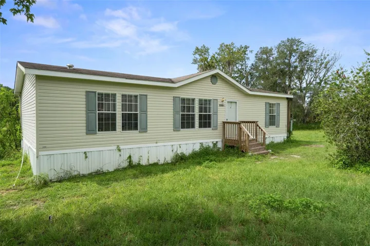 Well-kept 3-bedroom, 2-bath manufactured home built in 2014 with 1,296 sq ft of living space and a new back stoop added in 2026.