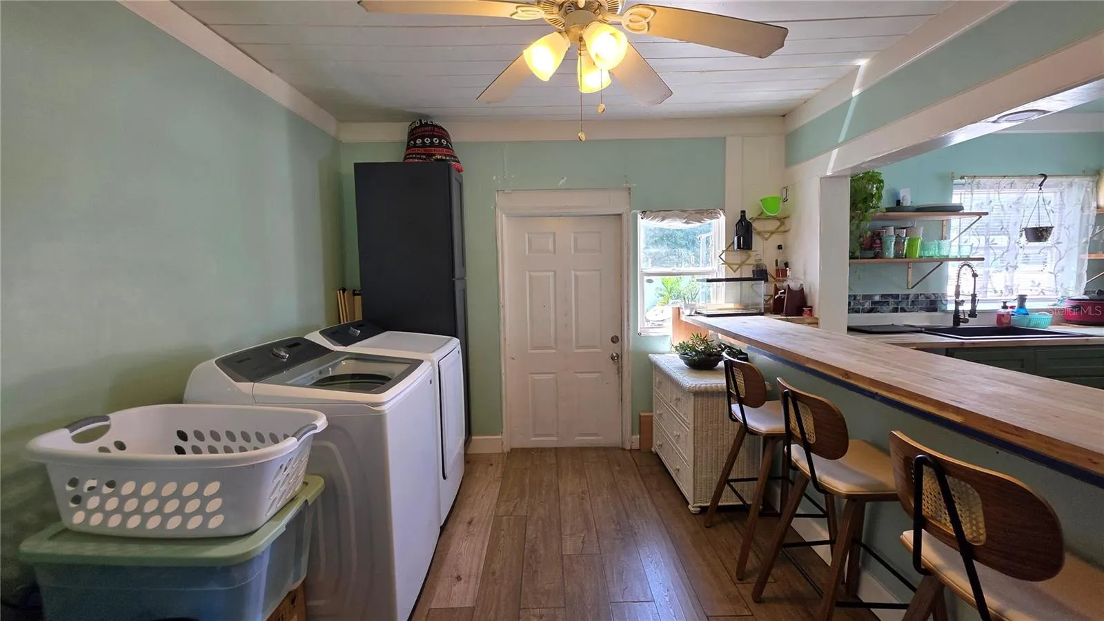 Inside Laundry Area, Breakfast Bar and Seating, Back Door Entry