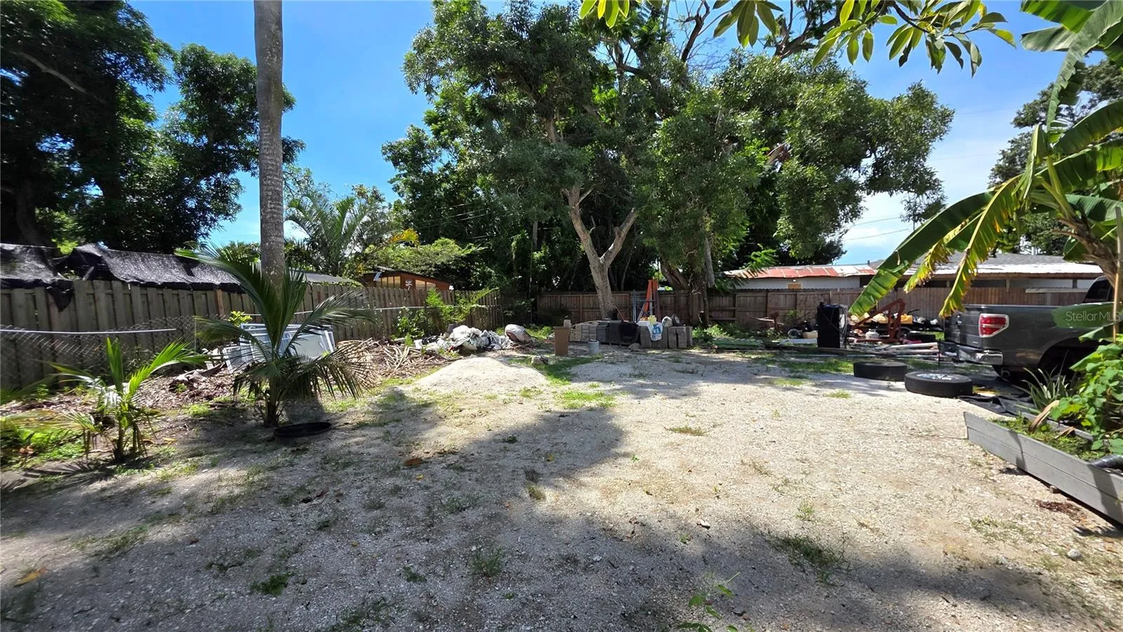 Backyard, Oversized Lot, Fully Fenced, Side driveway with Gated Entry to Backyard, Smaller Driveway on Back of Lot