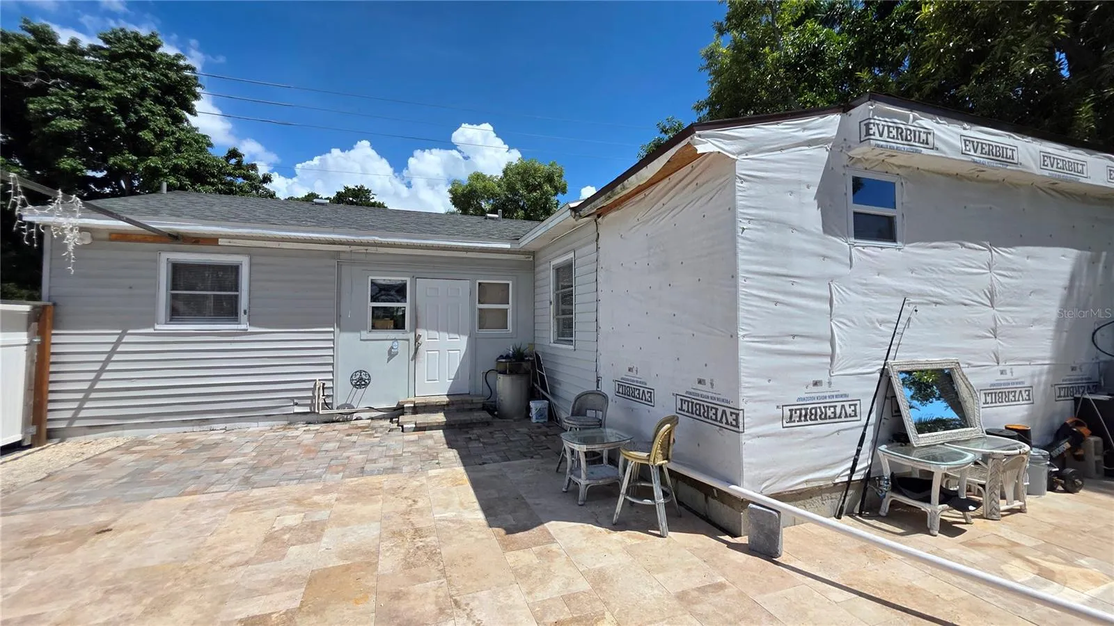 Back of Home and Back Door Entry. Temporary Addition started will need to be removed.
