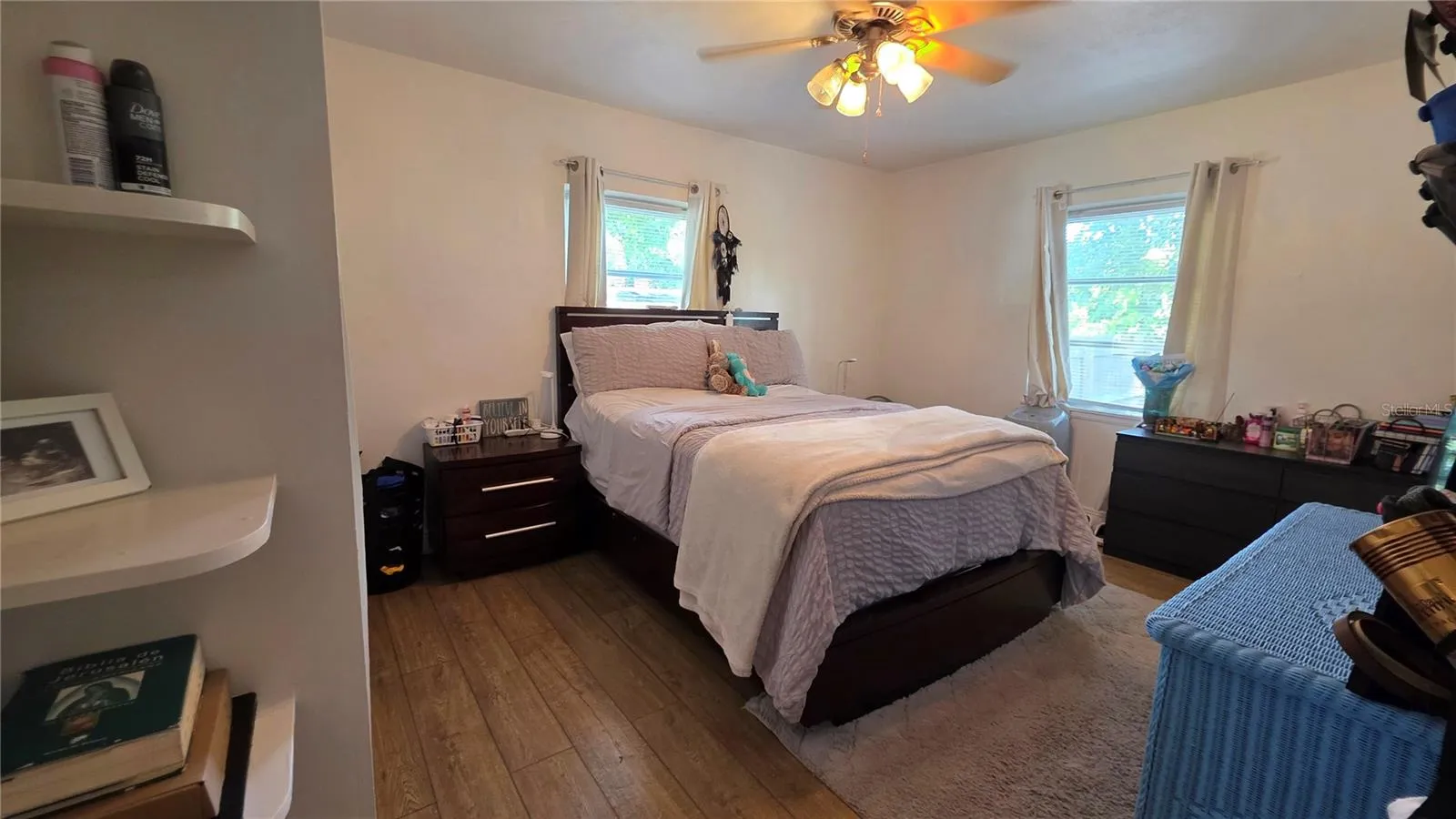 Primary Bedroom with 2 Windows, Laminate Flooring, and En-Suite Bathroom (non-functioning)